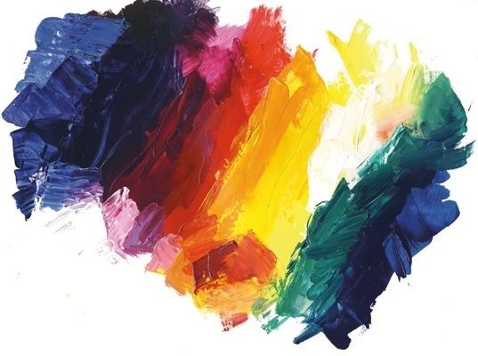 Bold swatches of blended acrylic paint in a spectrum of colors
